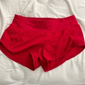 Red Lululemon shorts